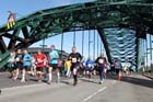 Runners going across Wearmouth Bridge during the Sunderland City 10k Road Race.